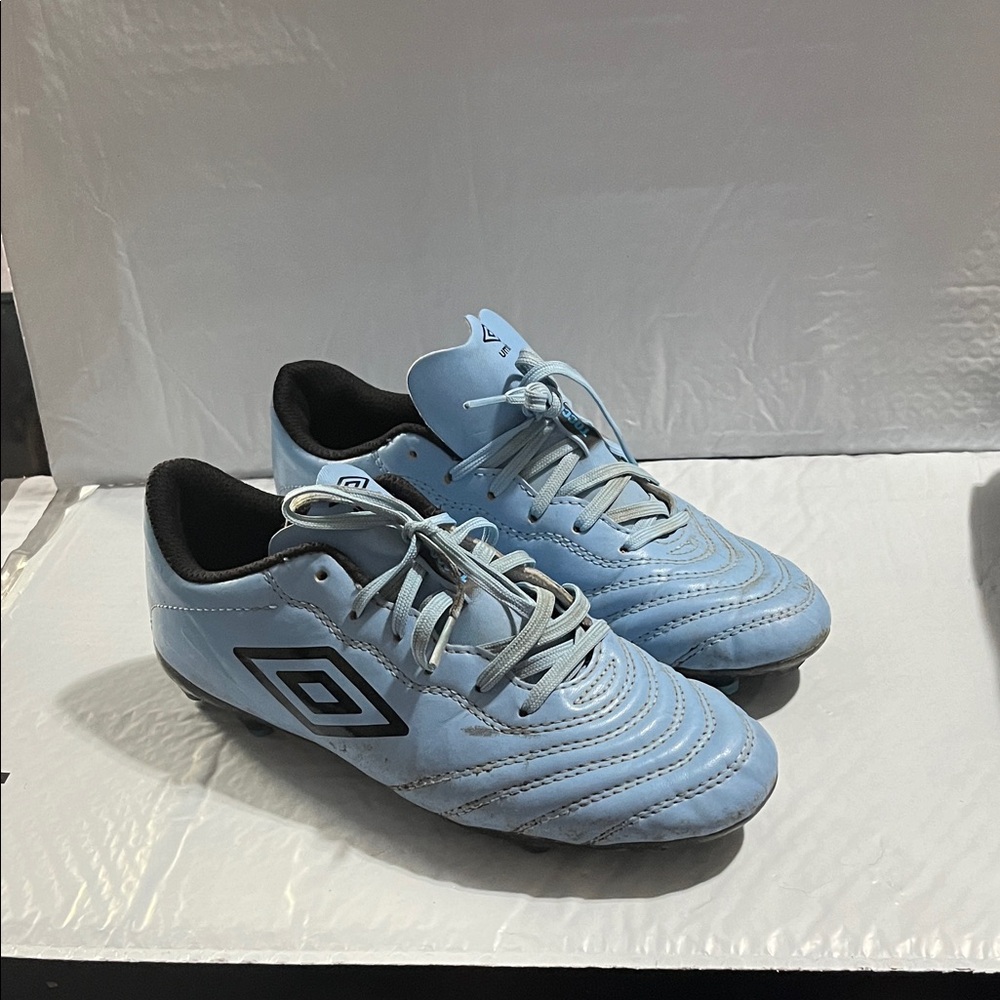 Umbro Sky Blue Soccer Cleats with Black Details